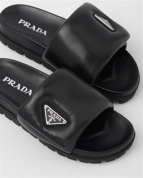 prada fluffy slides.